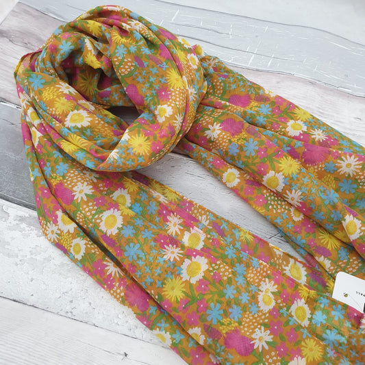 Hazel Pip designed scarf featuring yellow, pink and blue scarf