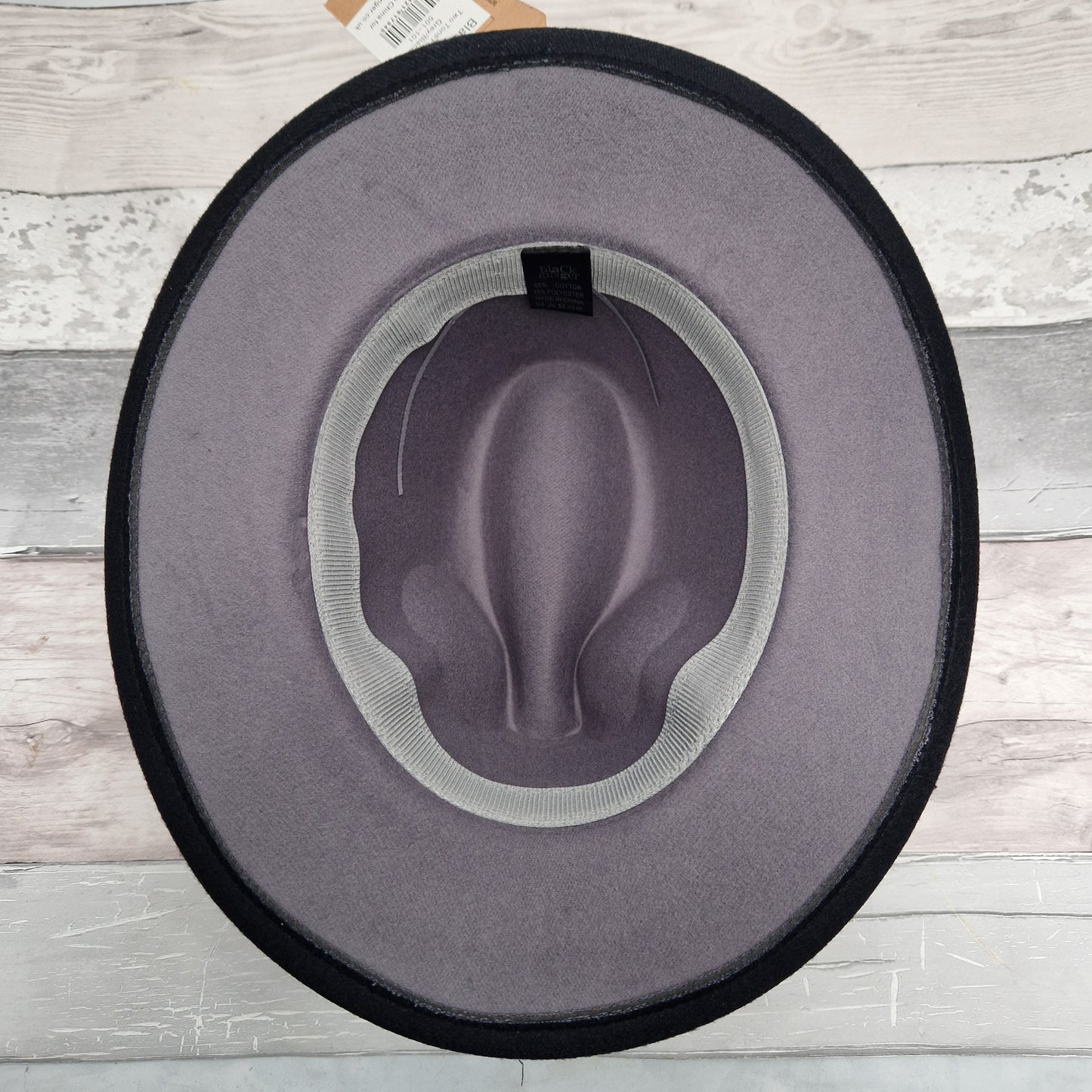 Inside view of a Fedora hat in grey felt.