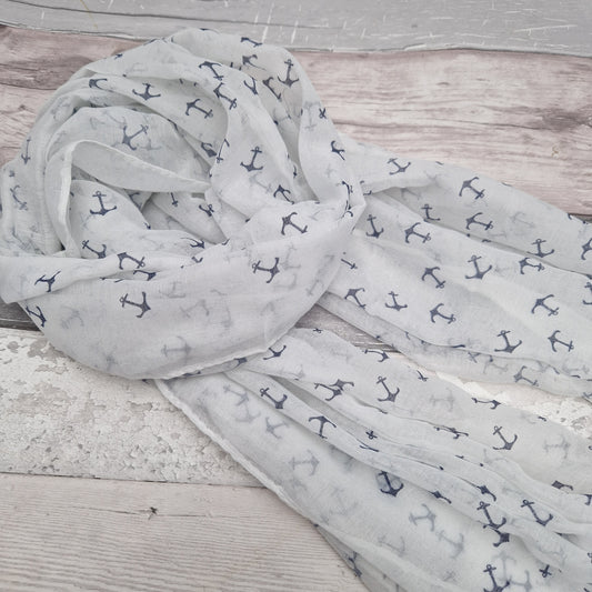 Nautical themed scarf in classic white, decorated with blue anchors