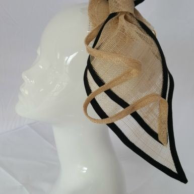 Large cream sinamay bow shaped fascinator