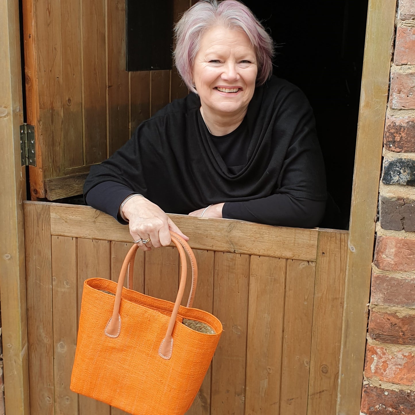 Lady with Orange Raffia basket