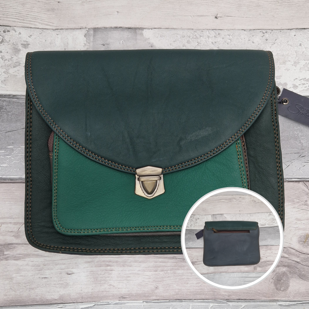 Green and black leather bag with a smaller inset showing a pouch on a wooden surface.
