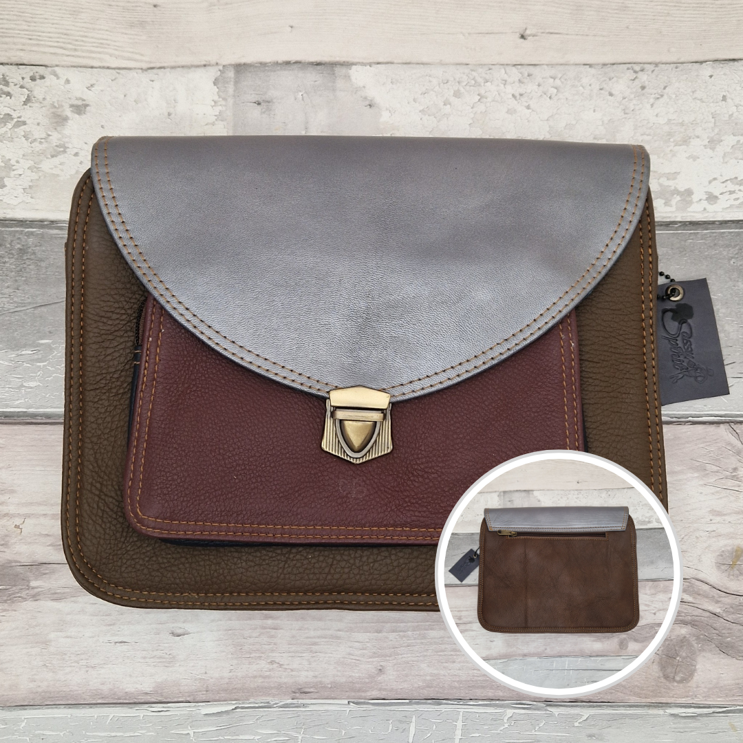 Brown and gray leather bag with a close-up inset on a wooden surface