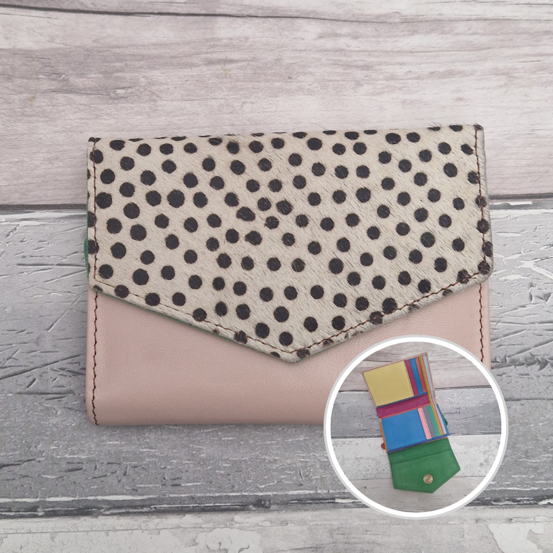 Pale Pink leather purse with a textured panel of spotty print.