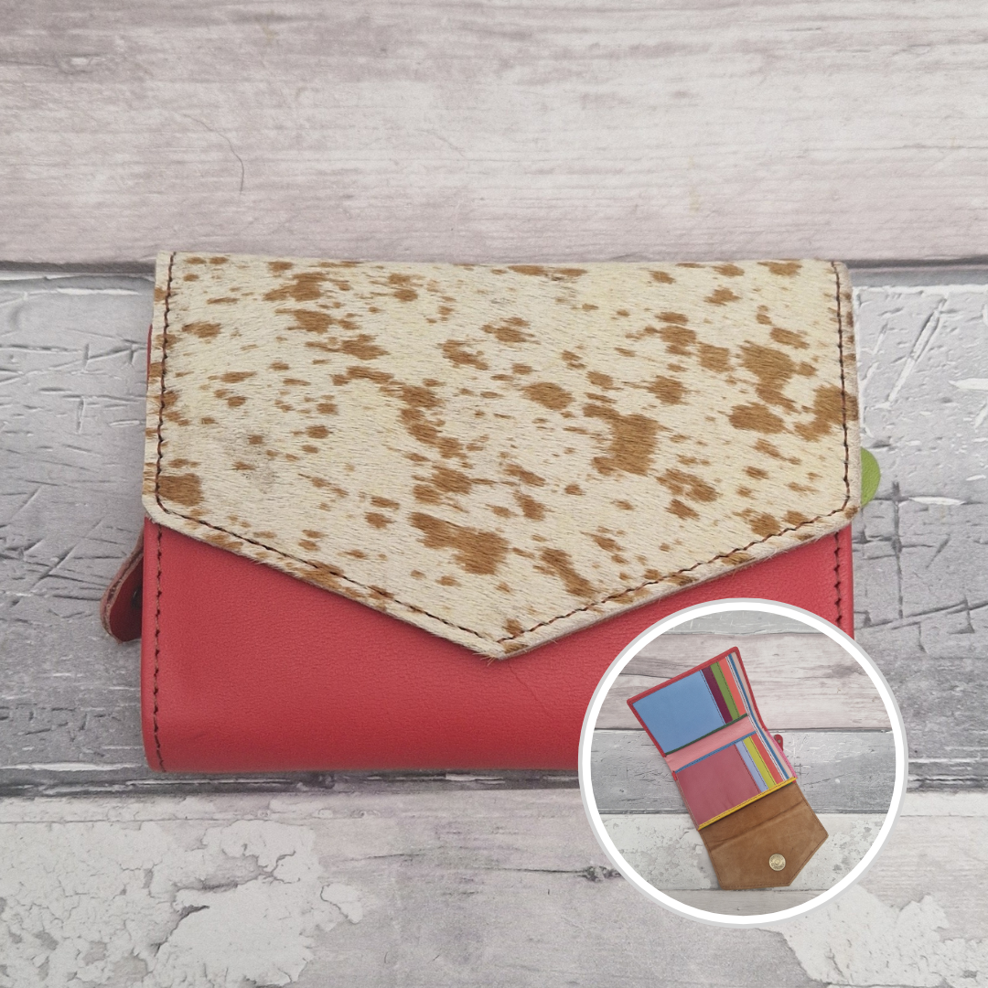 Salmon Pink leather fold out purse with a textured pony front panel and multi-coloured interior.