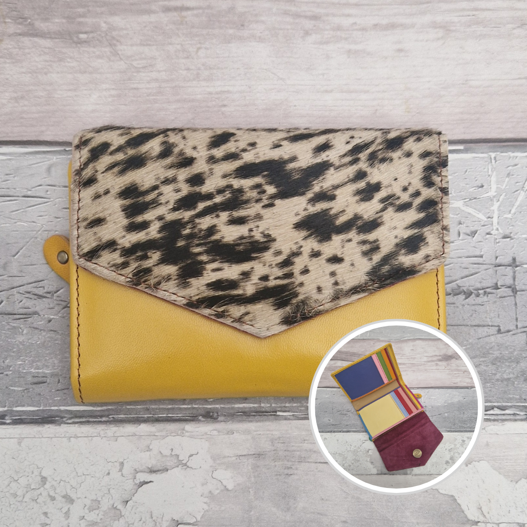 Yellow leather fold out purse with a textured pony print front panel and multi-coloured interior.