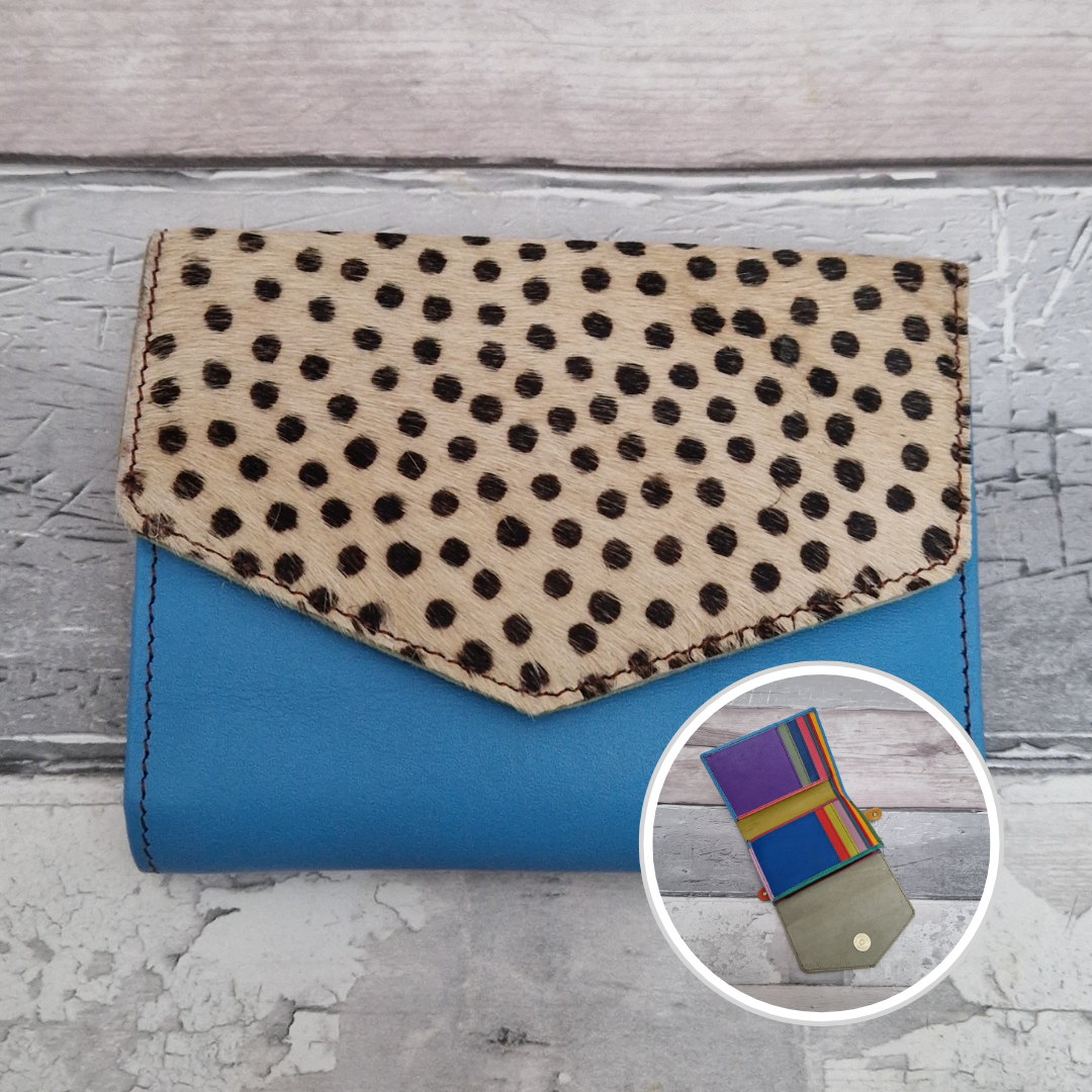 Sky Blue leather fold out purse with a textured spotty front panel and multi-coloured interior.