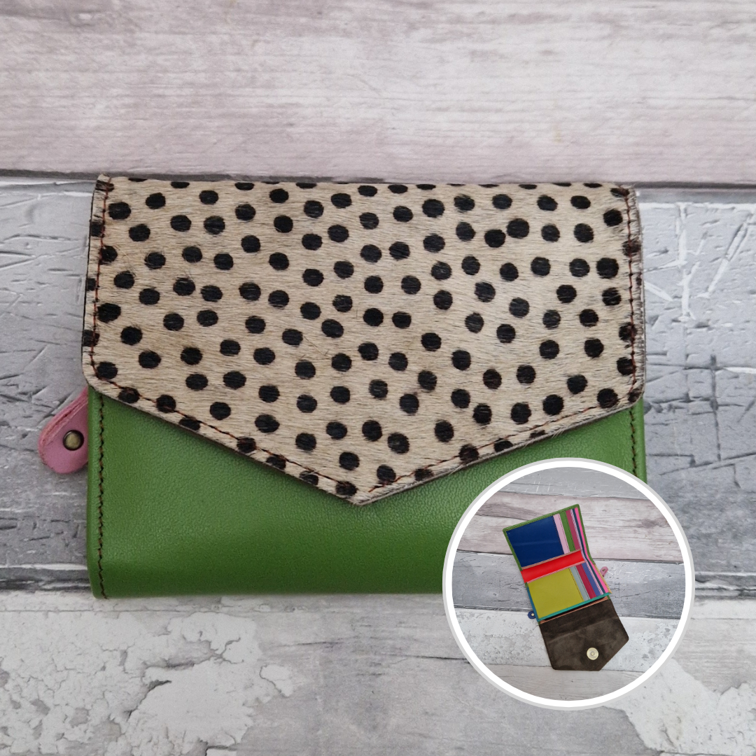 Green leather fold out purse with a textured spotty front panel and multi-coloured interior.