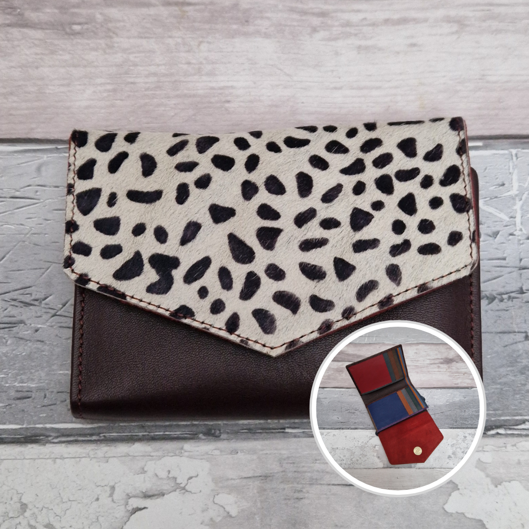Brown leather fold out purse with a textured spotty front panel and multi-coloured interior.