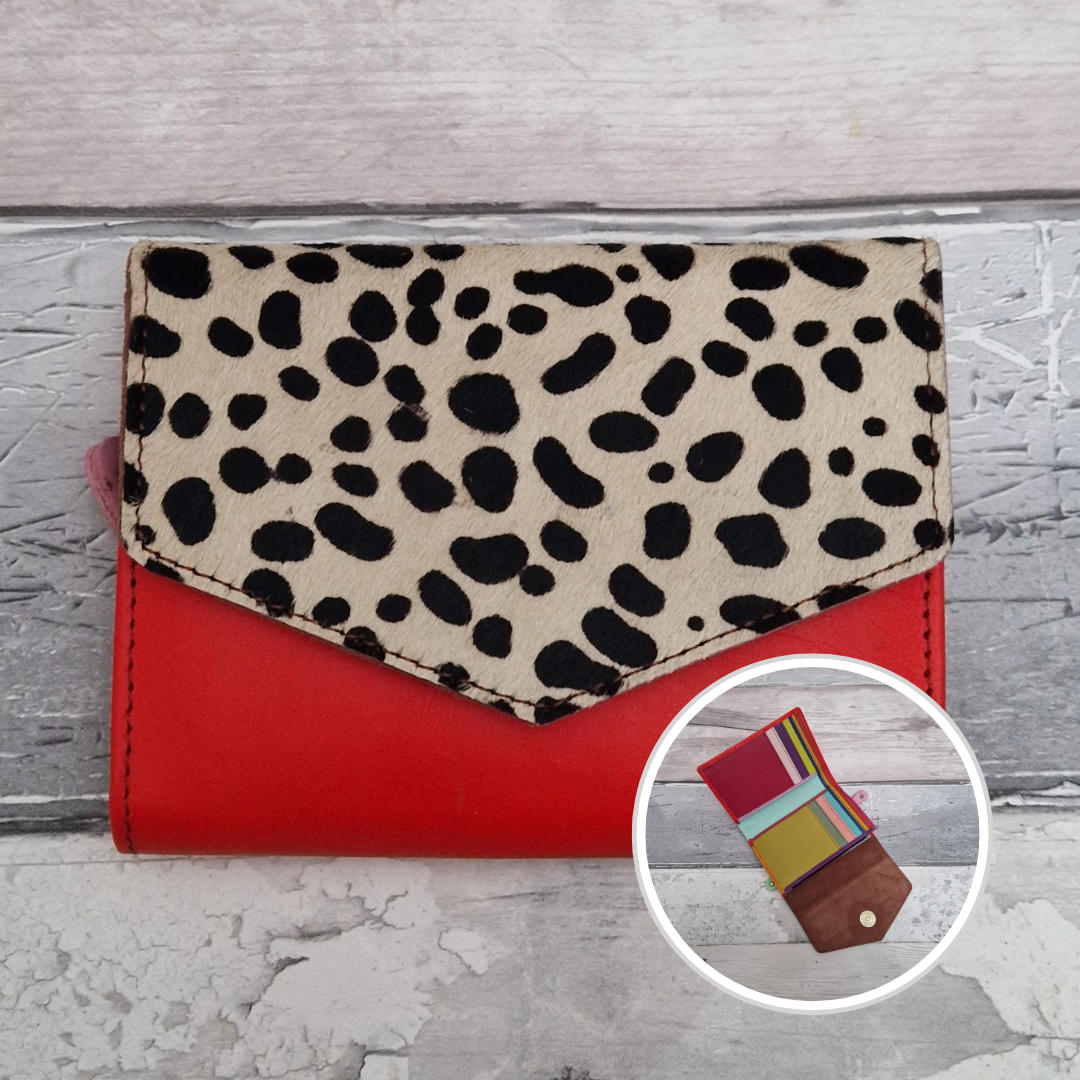 Red leather fold out purse with a textured spotty front panel and multi-coloured interior.