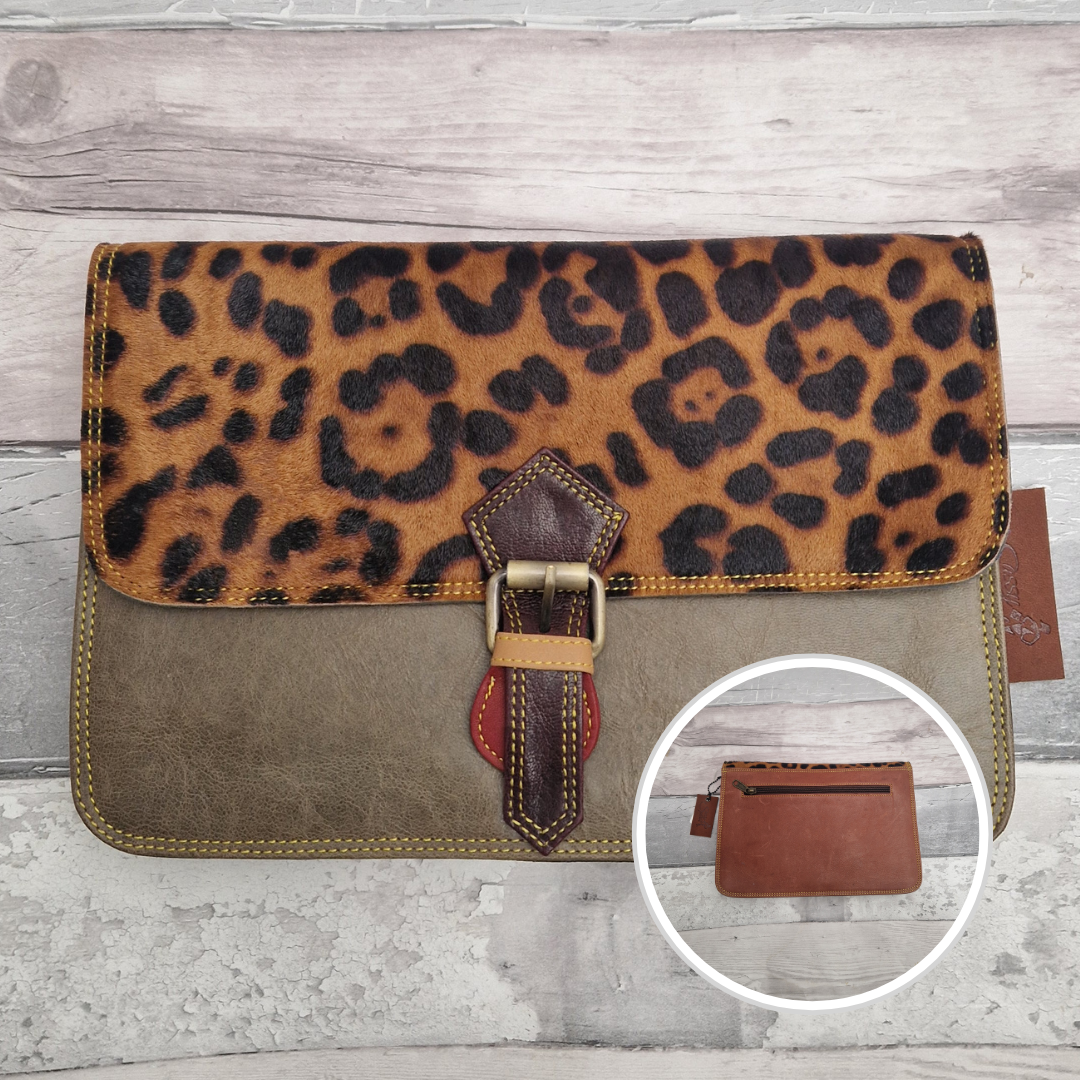 Green Leather envelope style bag with textured panel of Jaguar print and buckle clasp.