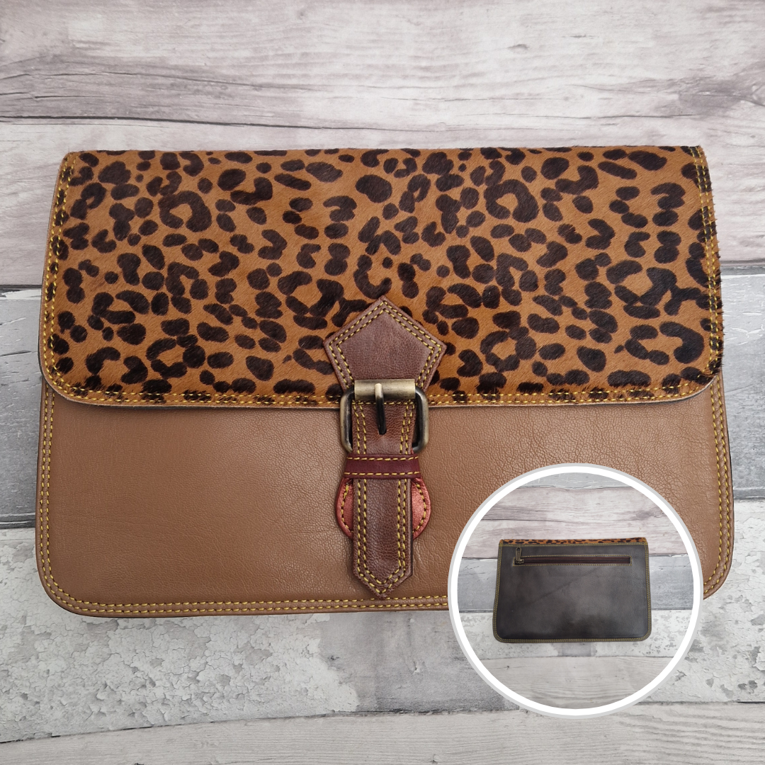 Brown Leather envelope style bag with textured panel of cheetah print and buckle clasp.