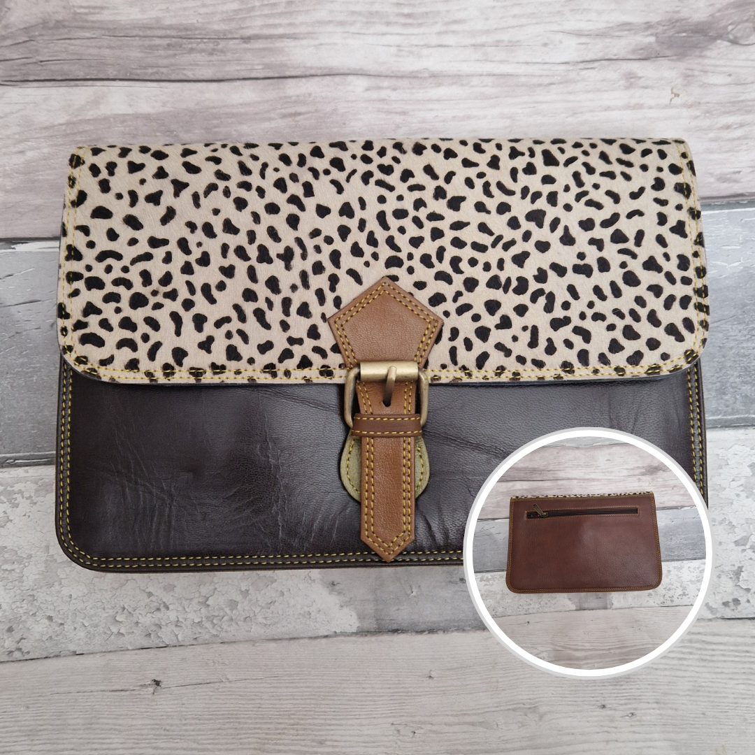 All leather envelope style crossbody bag in dark brown with a textured lynx animal print panel. Photo shows front and back of bag.