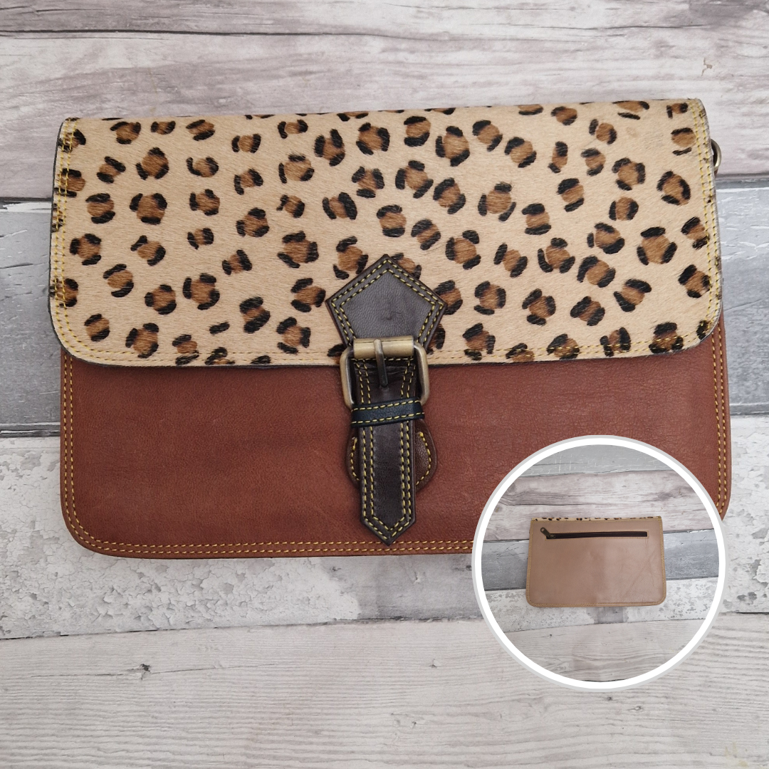 All leather envelope style crossbody bag in rust with a textured leopard animal print panel. Photo shows front and back of bag.