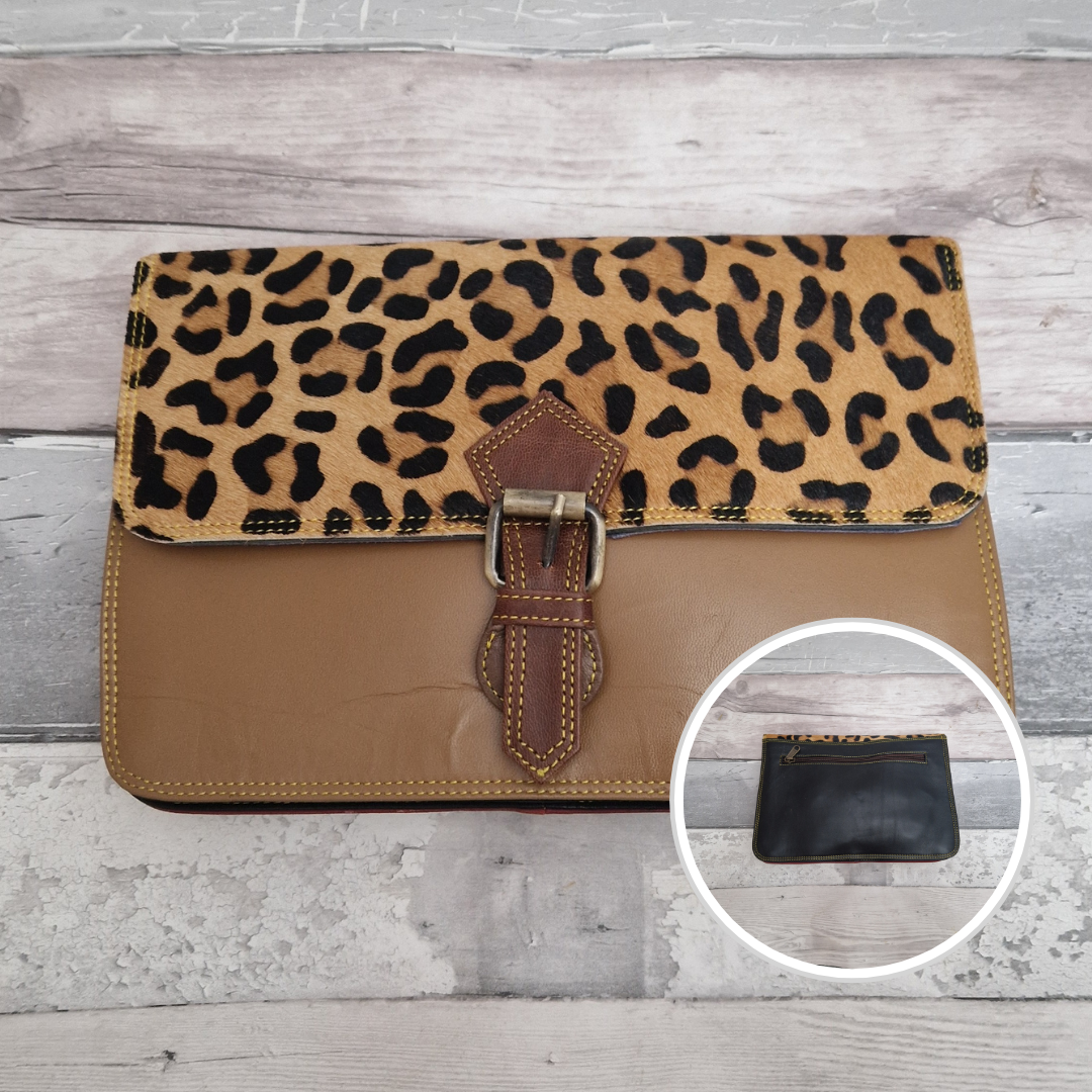 All leather envelope style crossbody bag in biscuit with a textured leopard animal print panel. Photo shows front and back of bag.
