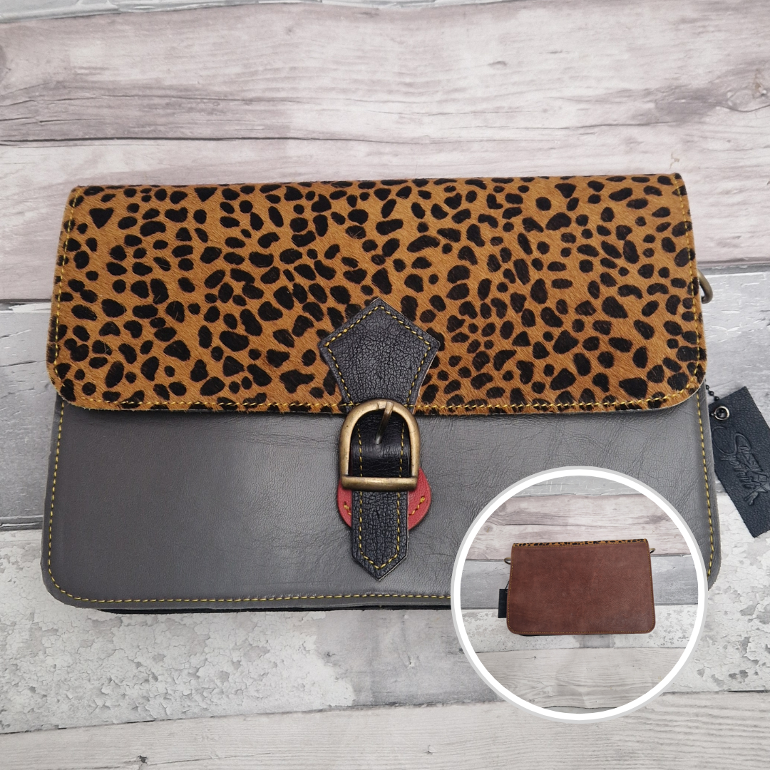 Grey Leather envelope style bag with textured panel of cheetah print and buckle clasp.