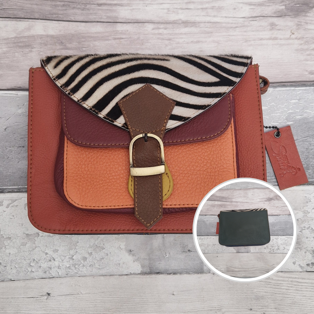 Mini satchel style crossbody bag. All leather made in a mix of colours with a textured panel of zebra print.