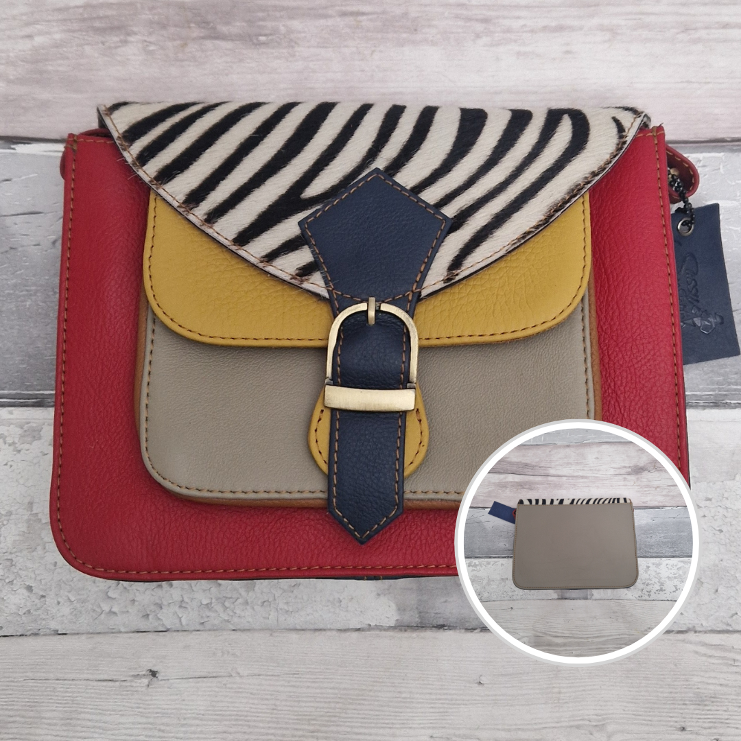 Mini satchel style crossbody bag. All leather made in a mix of colours with a textured panel of zebra print.