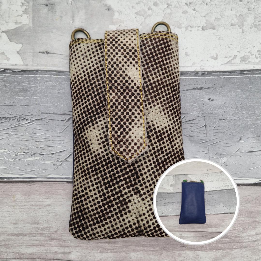 Snakeskin crossbody pouch made from leather.