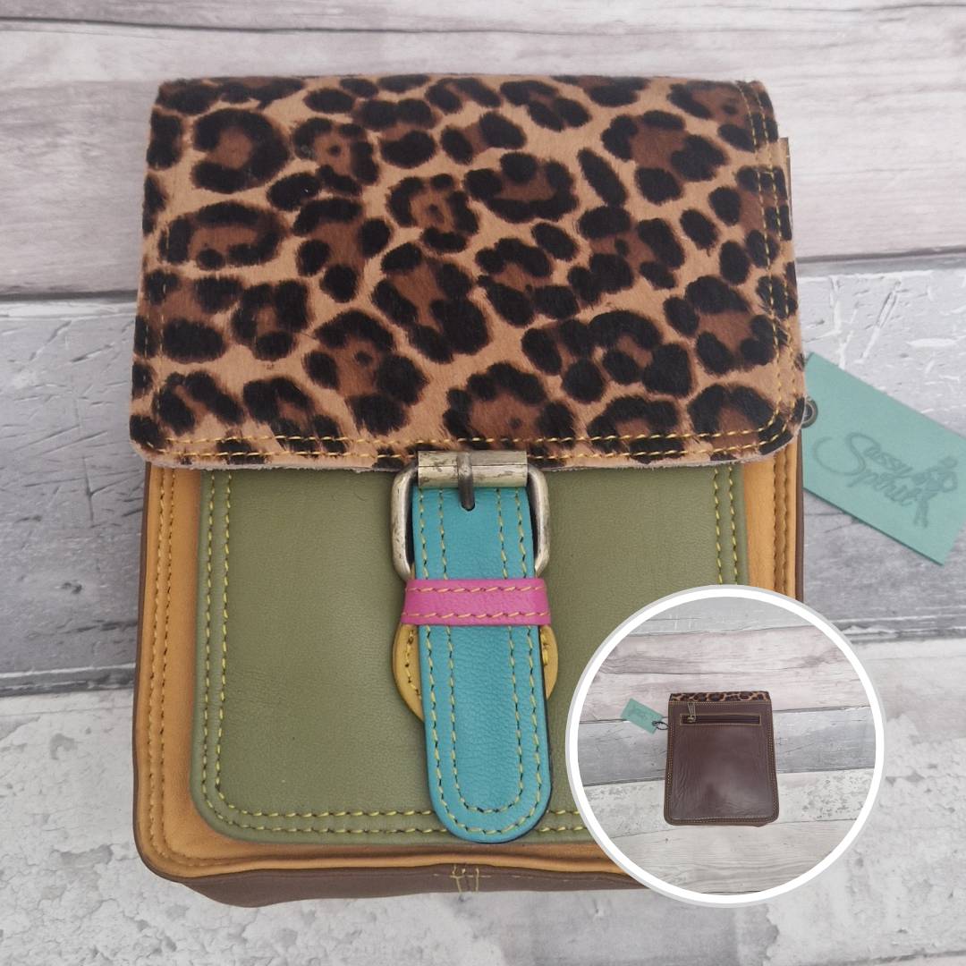 All leather mini satchel style bag with green and yellow panel finished with a textured leopard animal print.