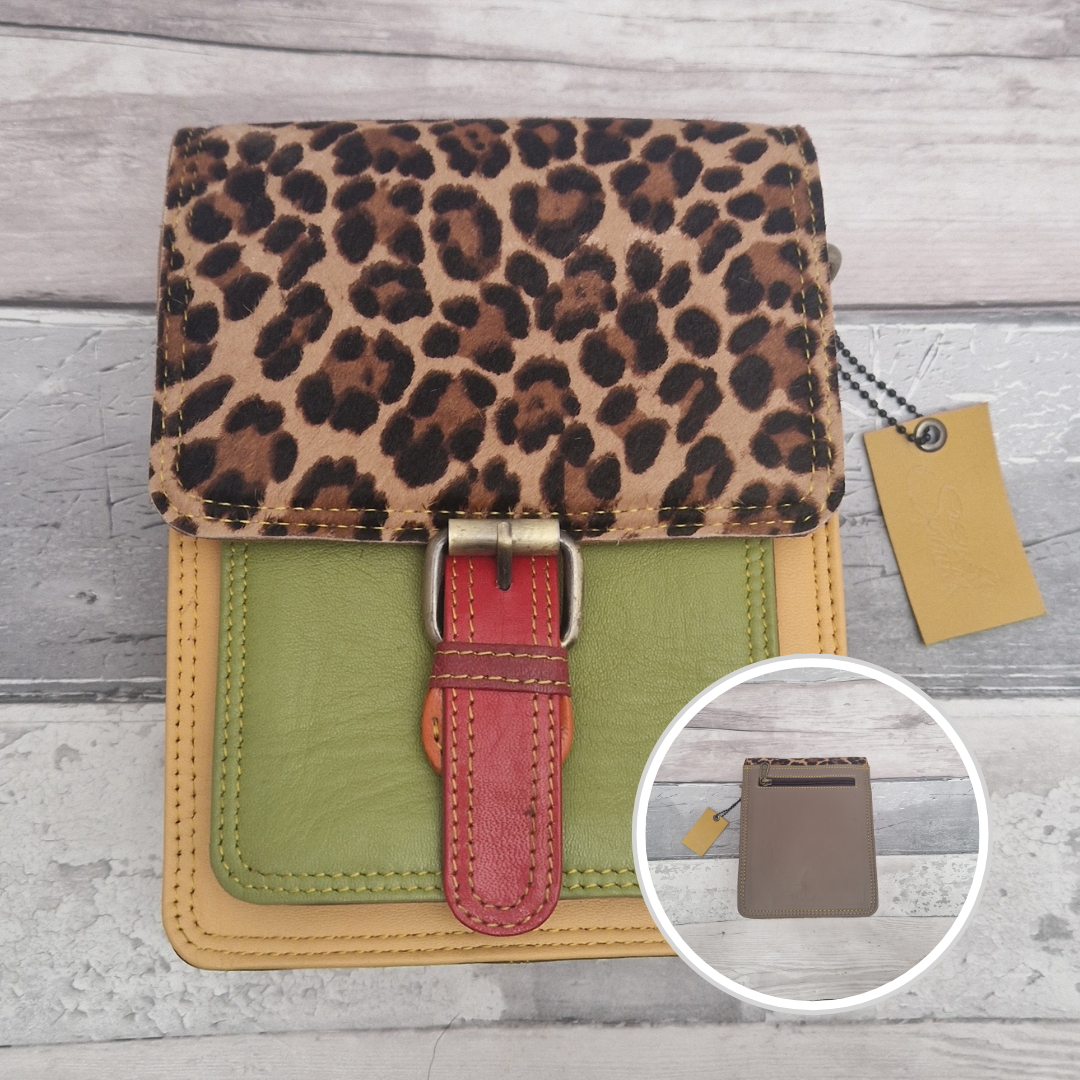All leather mini satchel style bag with green and yellow panel finished with a textured leopard animal print.