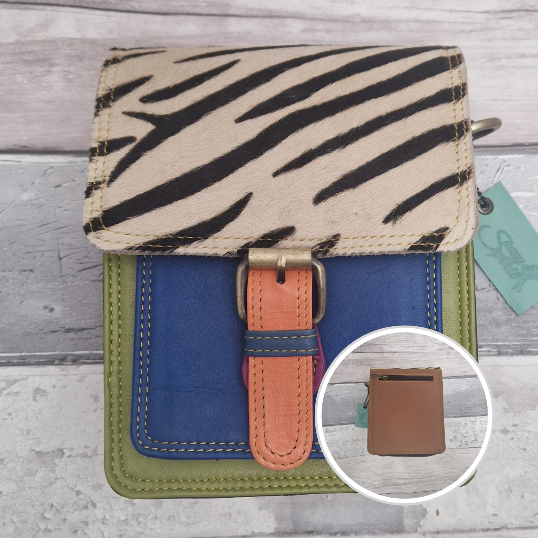 All leather mini satchel style bag with green and blue panel finished with a textured zebra animal print.