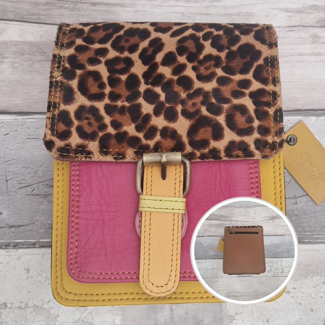 All leather mini satchel style bag with pink and yellow panel finished with a textured leopard animal print.