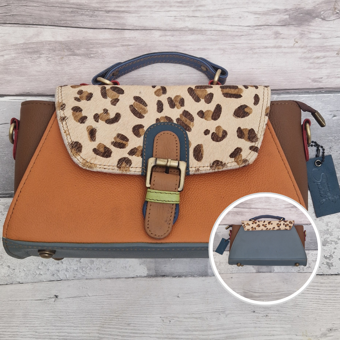 Mini satchel style ladies all leather handbag. Mixed brown and orange colours with a panel of textured leopard print.