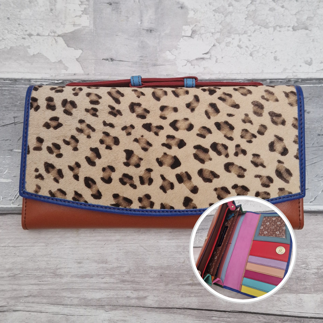 All leather purse with an orange and blue coloured exterior and textured panel of leopard print.