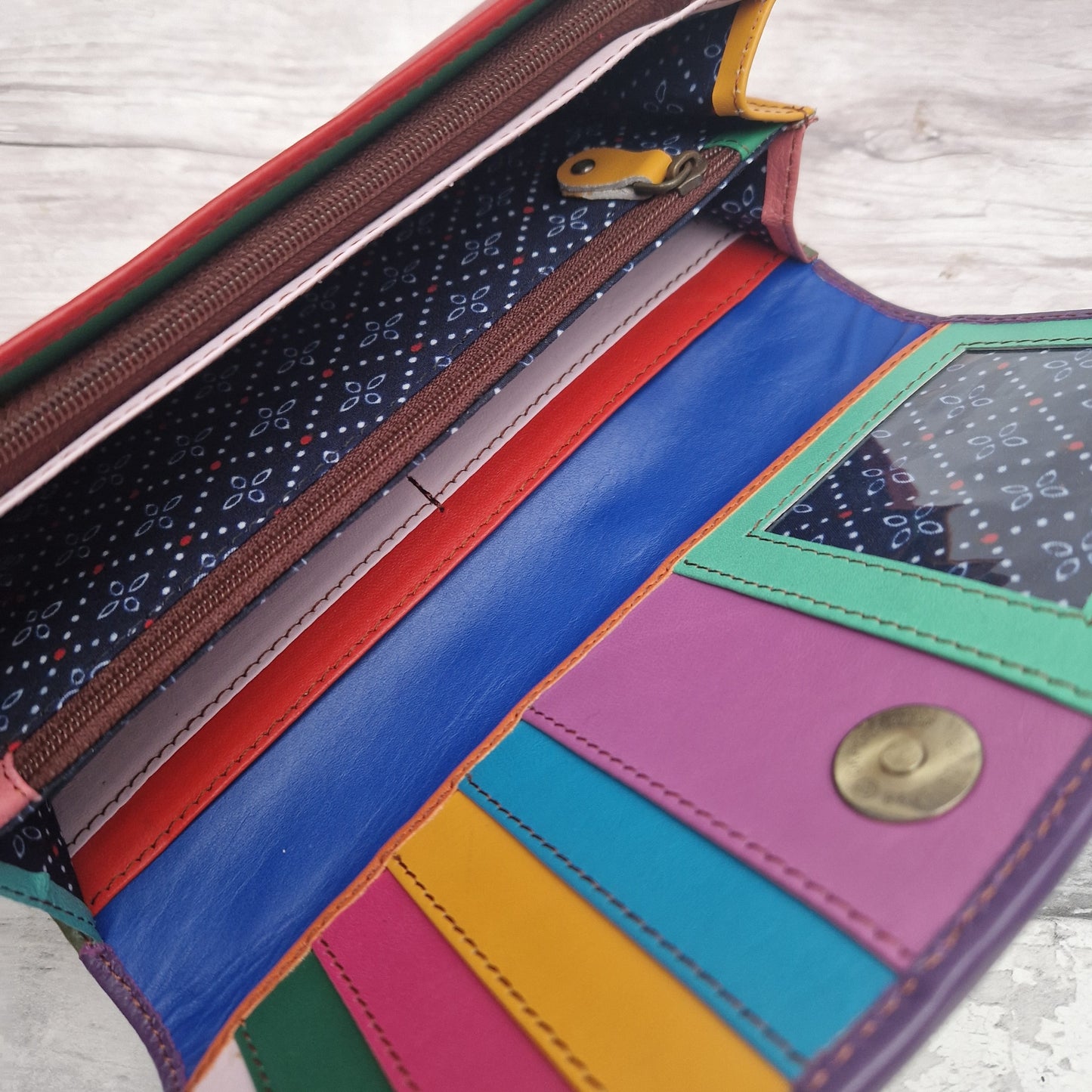 Inside view of the Kanti purse showing a bright and colourful use of the leather off-cuts used.