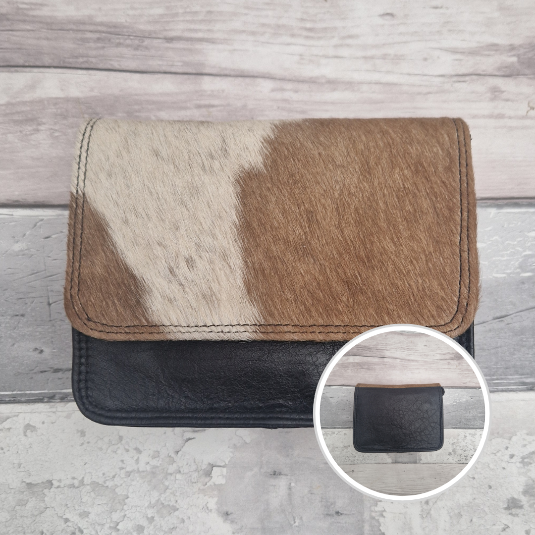 Leather bag with a textured flap of pony print.