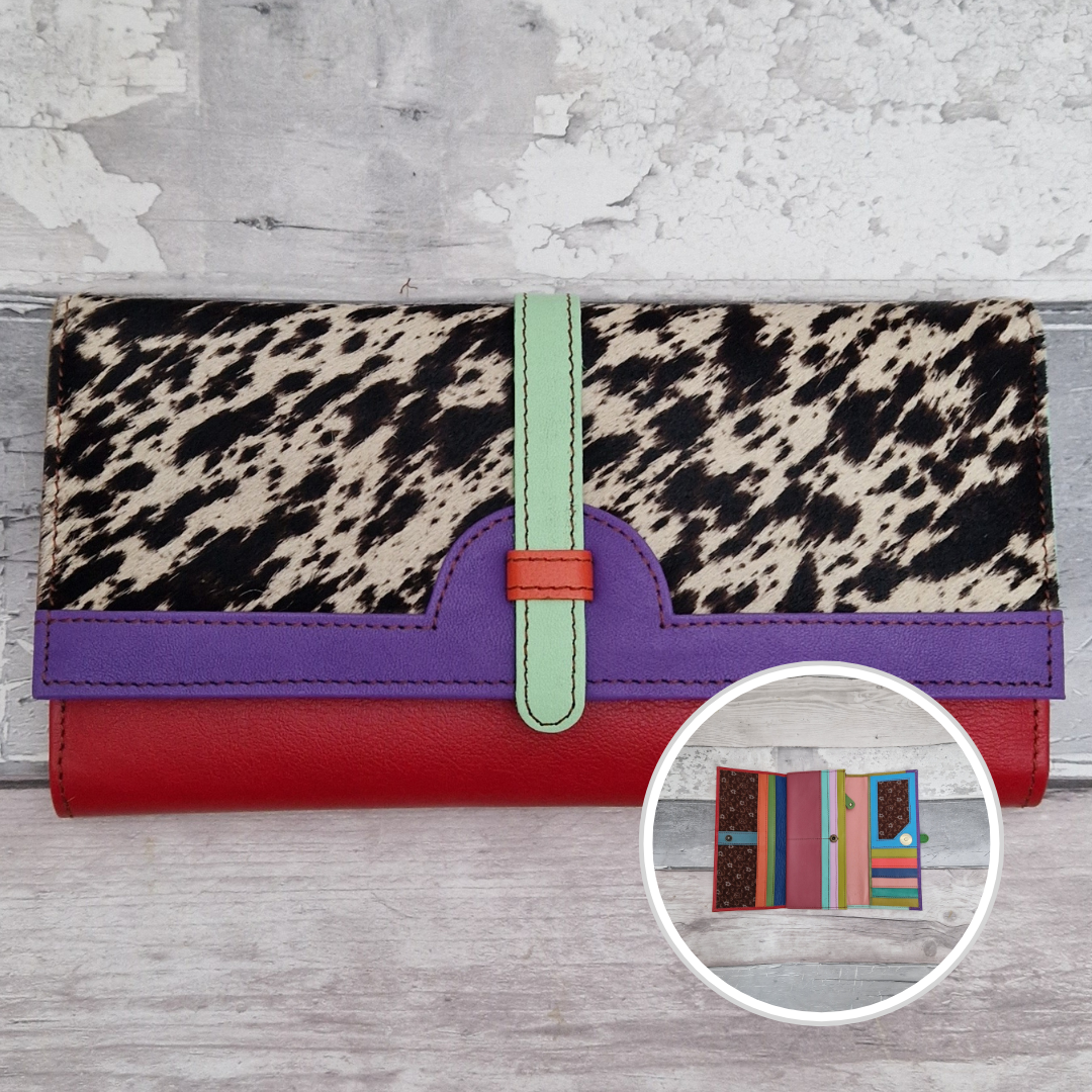 All leather fold out purse made from a rainbow of colours with a textured front panel of pony print.