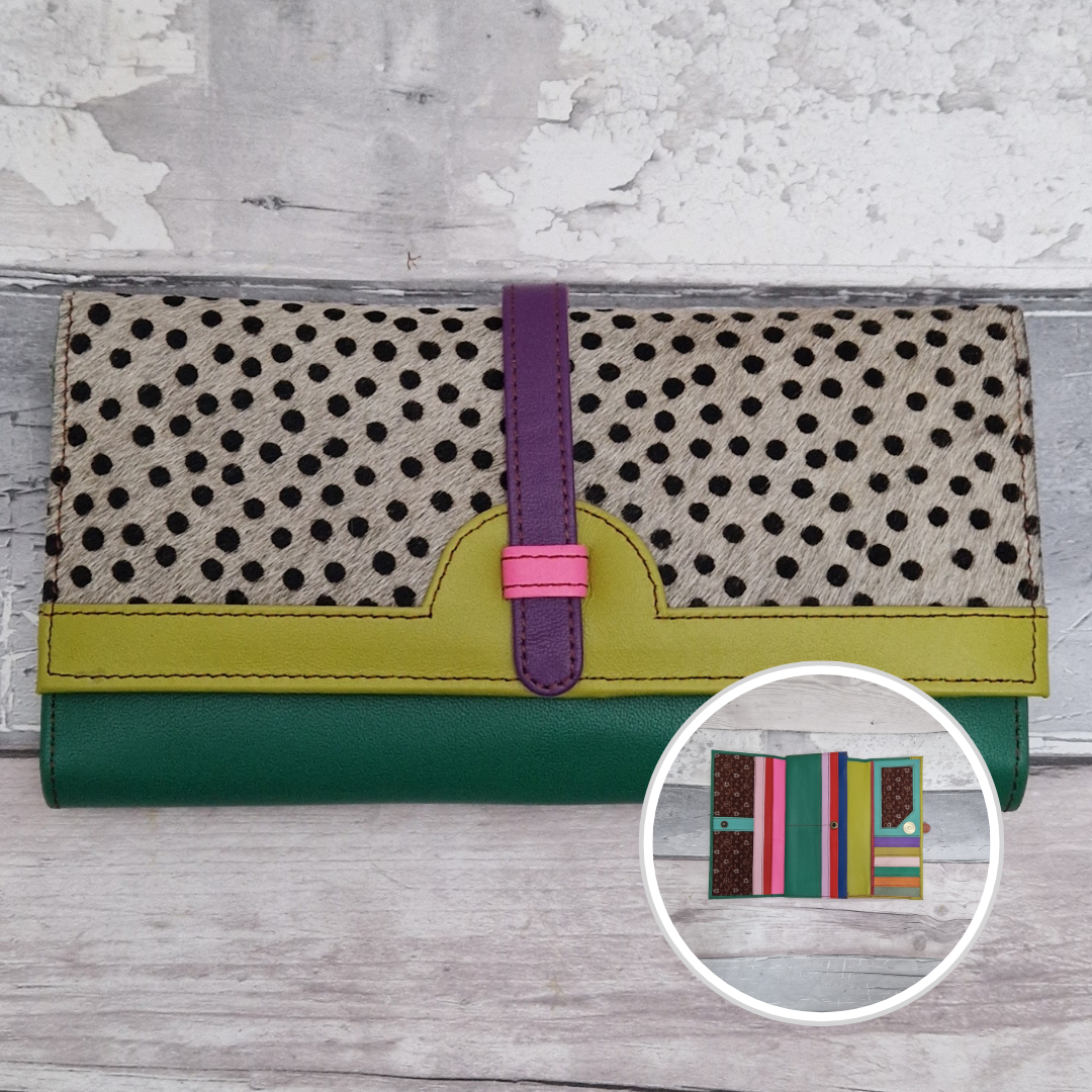 All leather fold out purse made from a rainbow of colours with a textured front panel of spot print.