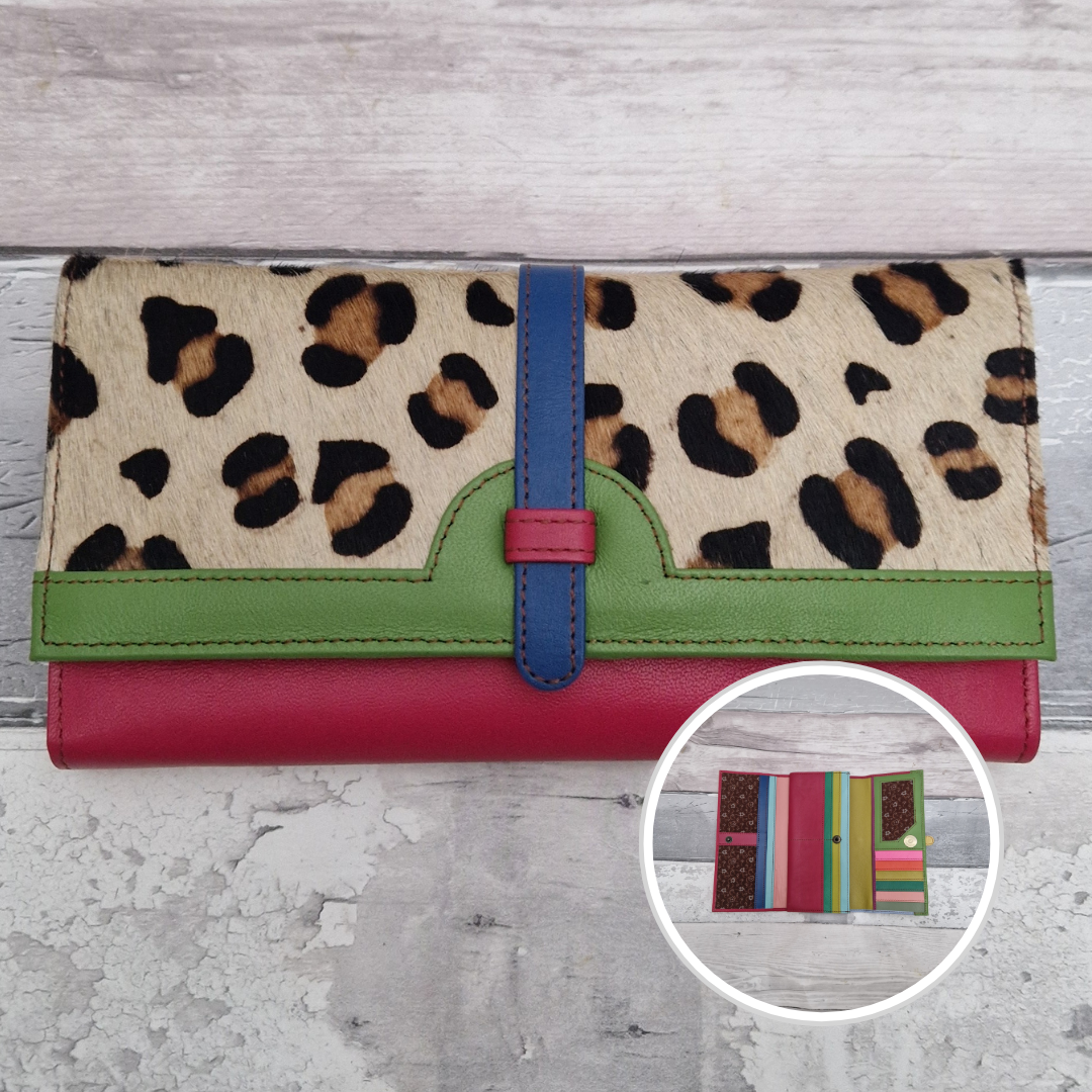 All leather fold out purse made from a rainbow of colours with a textured front panel of leopard print.