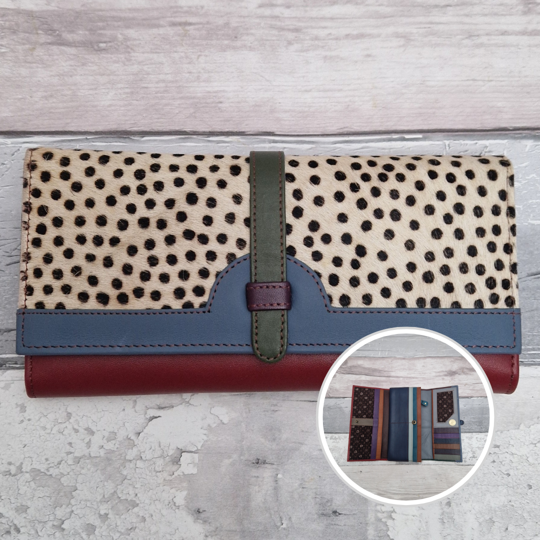 All leather fold out purse made from a rainbow of colours with a textured front panel of spot print.