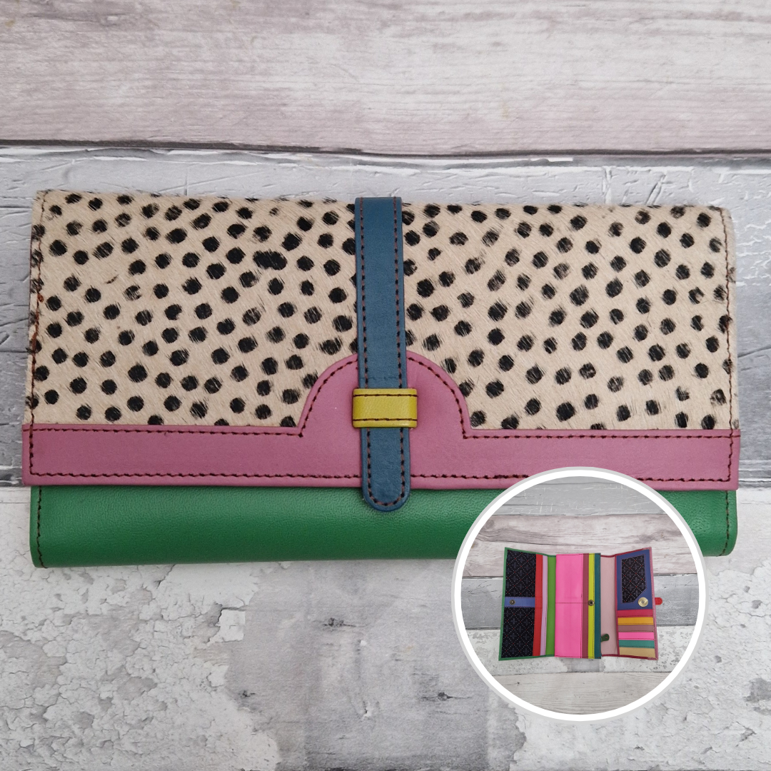 All leather fold out purse made from a rainbow of colours with a textured front panel of spot print.