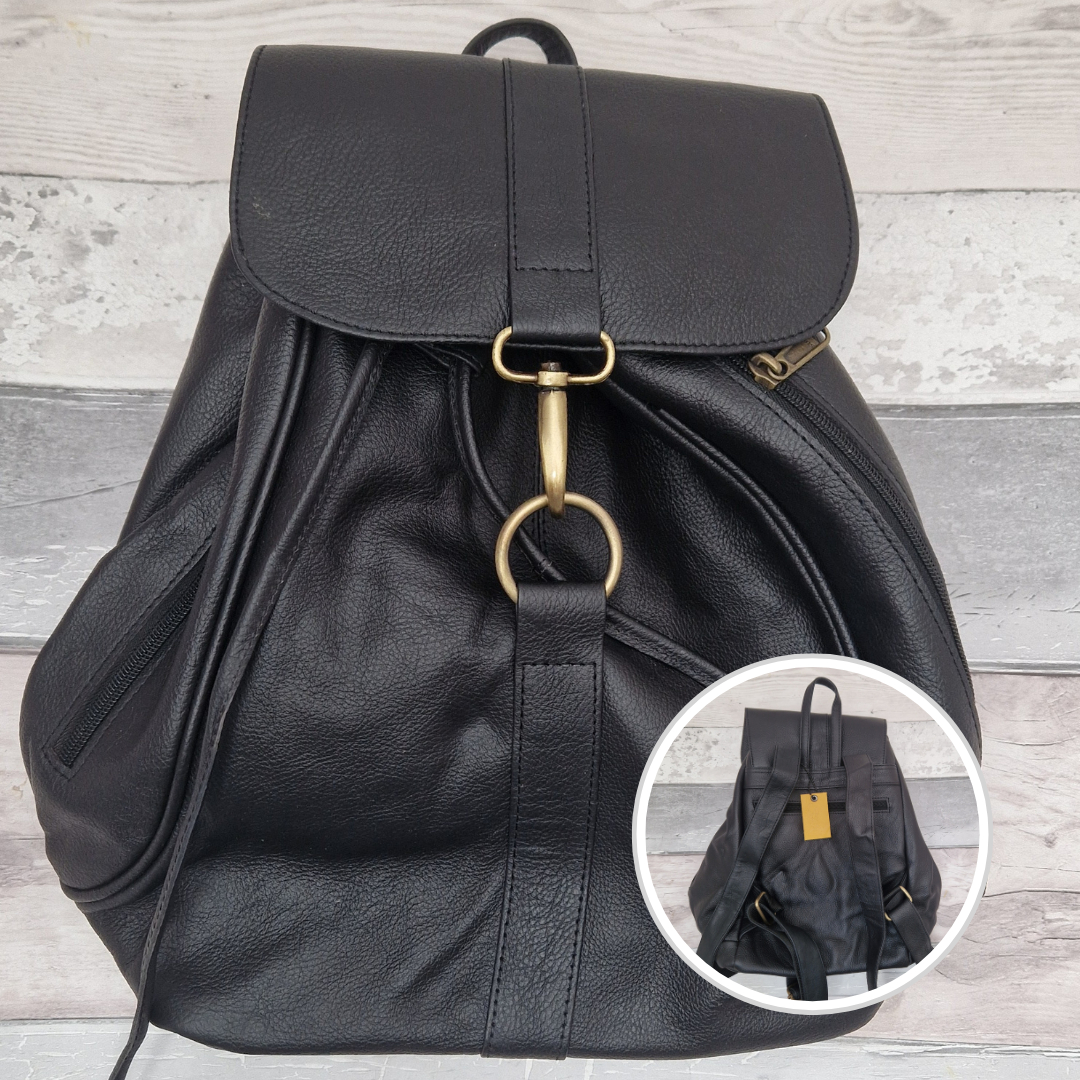 Black leather back pack with lobster claw ring lock.