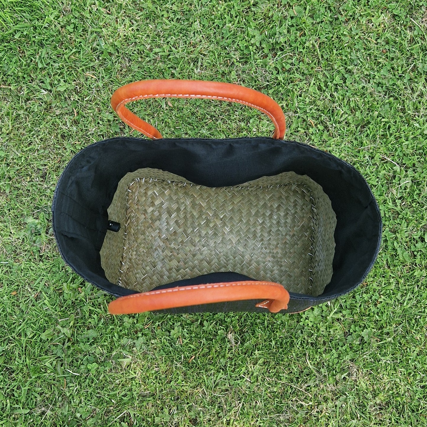 Inside view of black raffia basket.