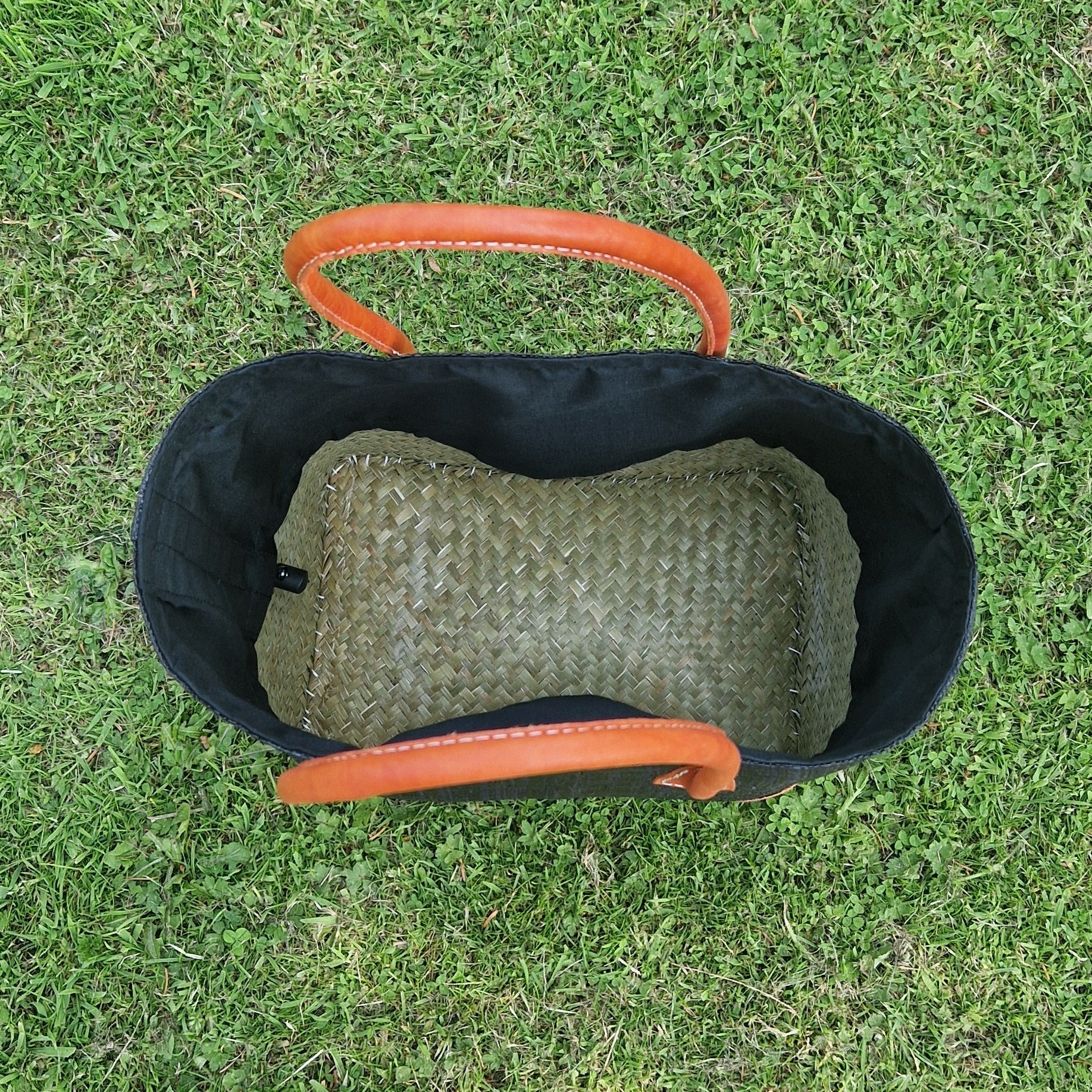 Inside view of black raffia basket.