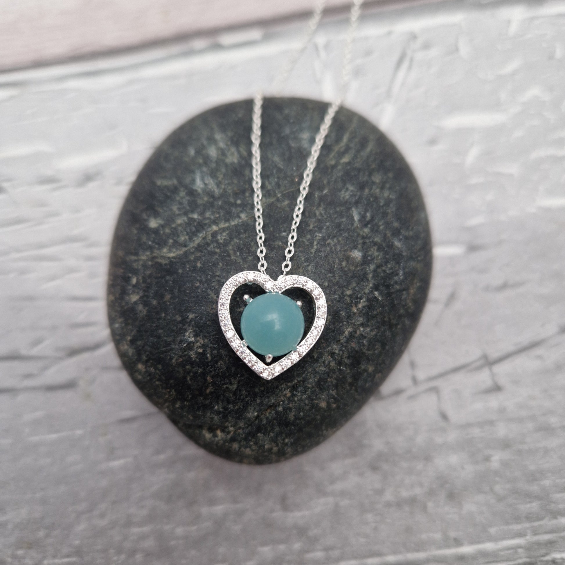 Love heart pendant set with an Amazonite crystal.