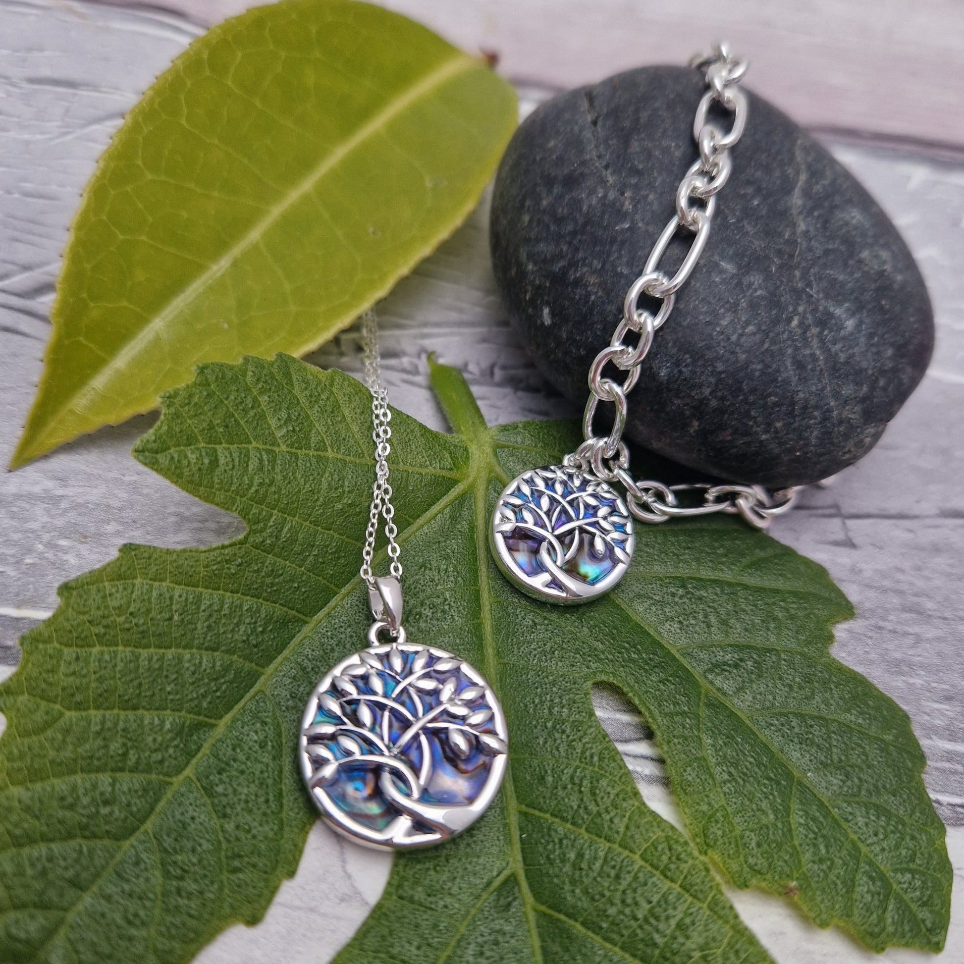 New Zealand Paua Shell featuring a Silver Tree of Life, necklace and bracelet.