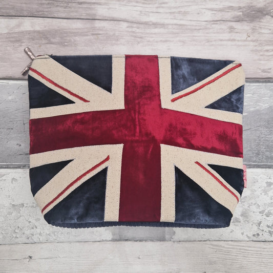 Union Jack design pouch on a wooden surface