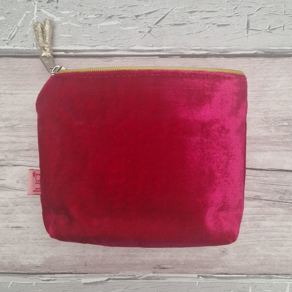 Reverse side of  hot pink velvet coin purse.
