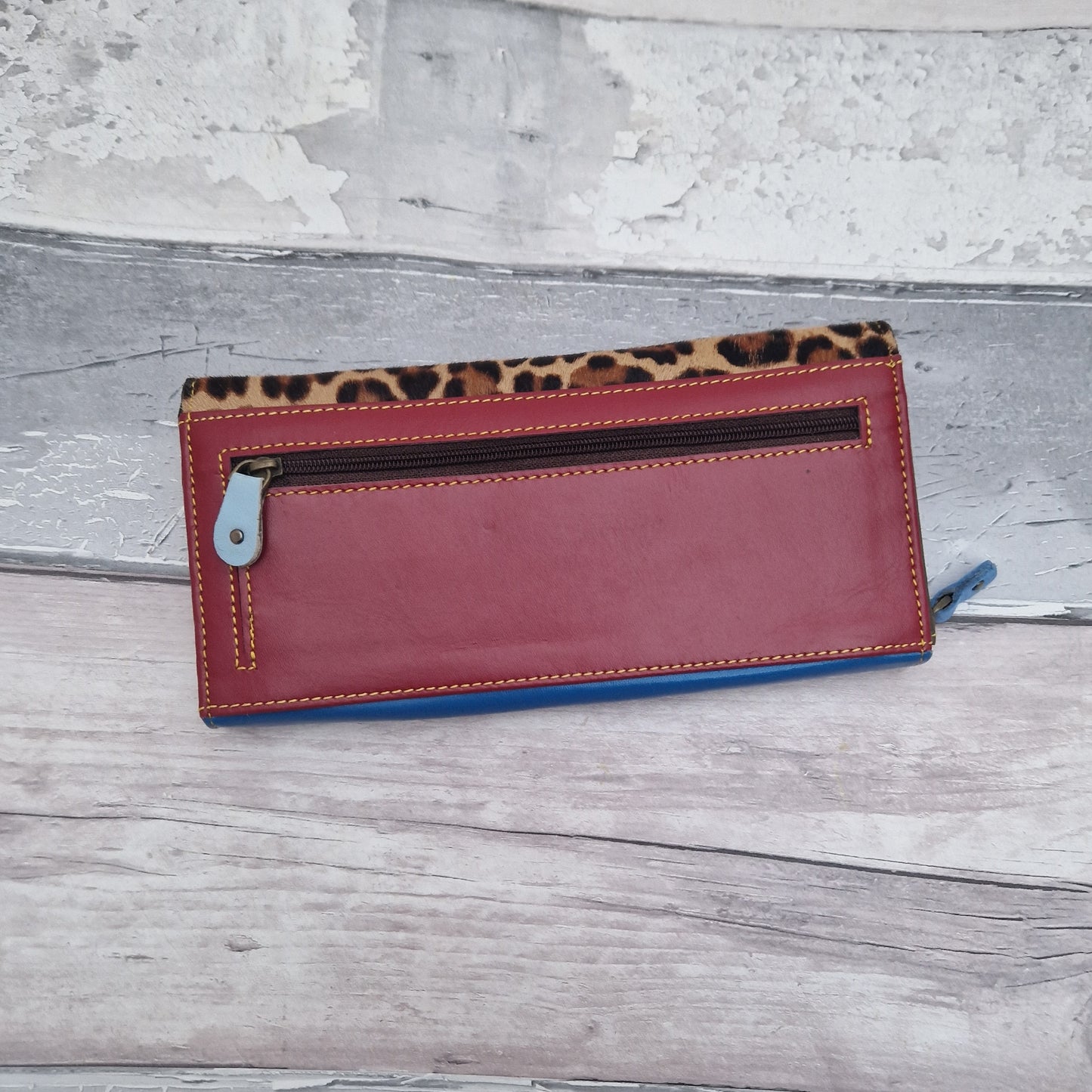 Purse made from a colourful mixture of leather off cuts.