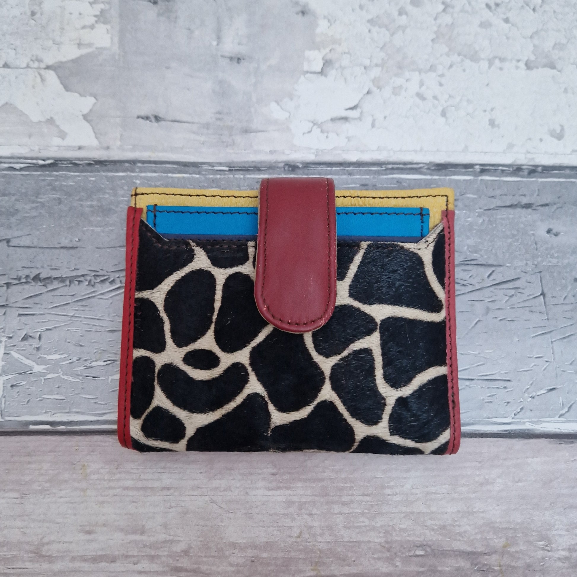Giraffe print card wallet in a textured finish.