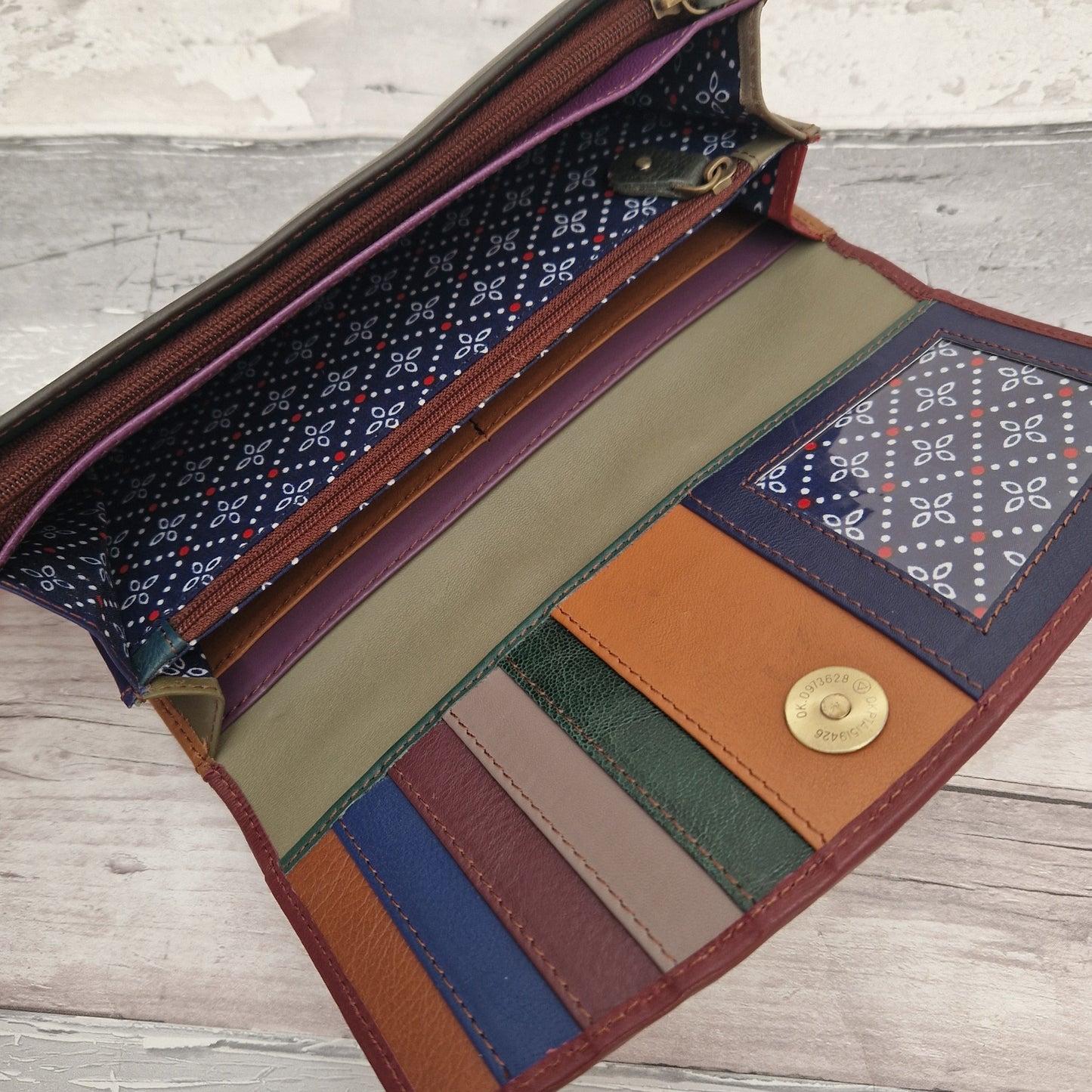 Inside view of the Kanti purse showing the use of the leather off-cuts in a multitude of colours.