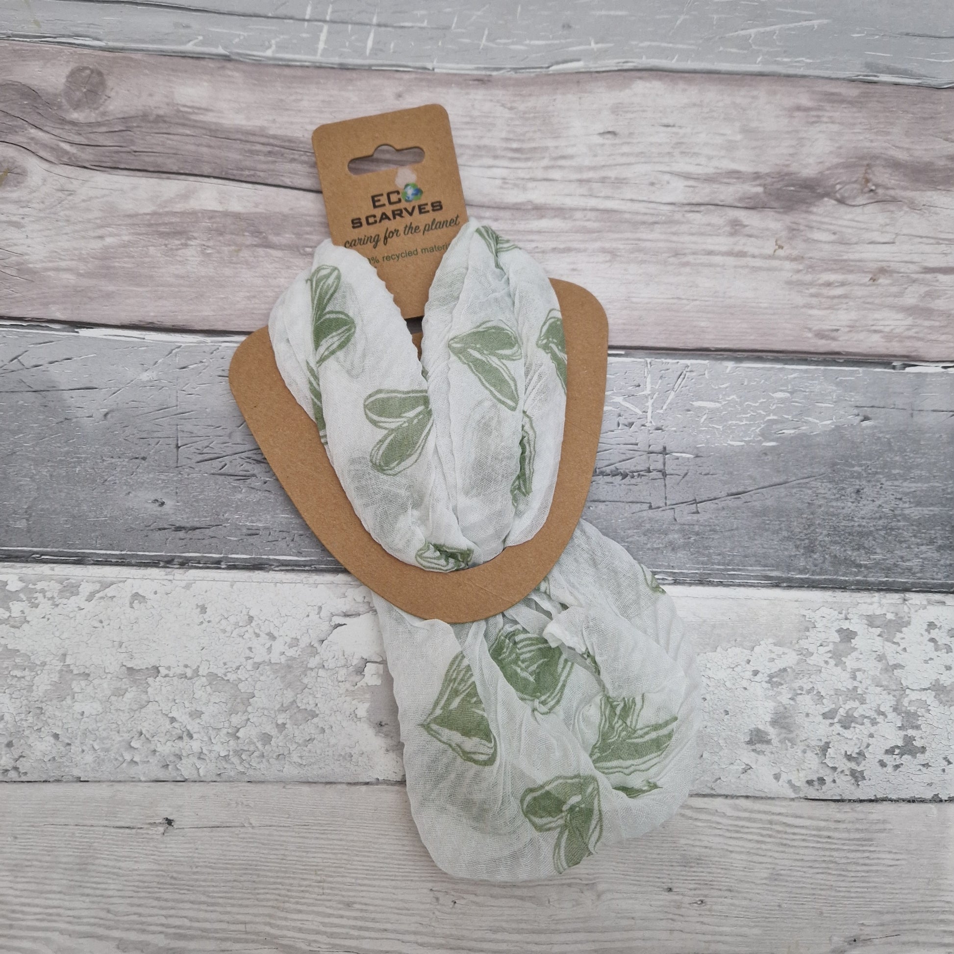 White magnetic neck scarf in a crinkle fabric, decorated with green love hearts.