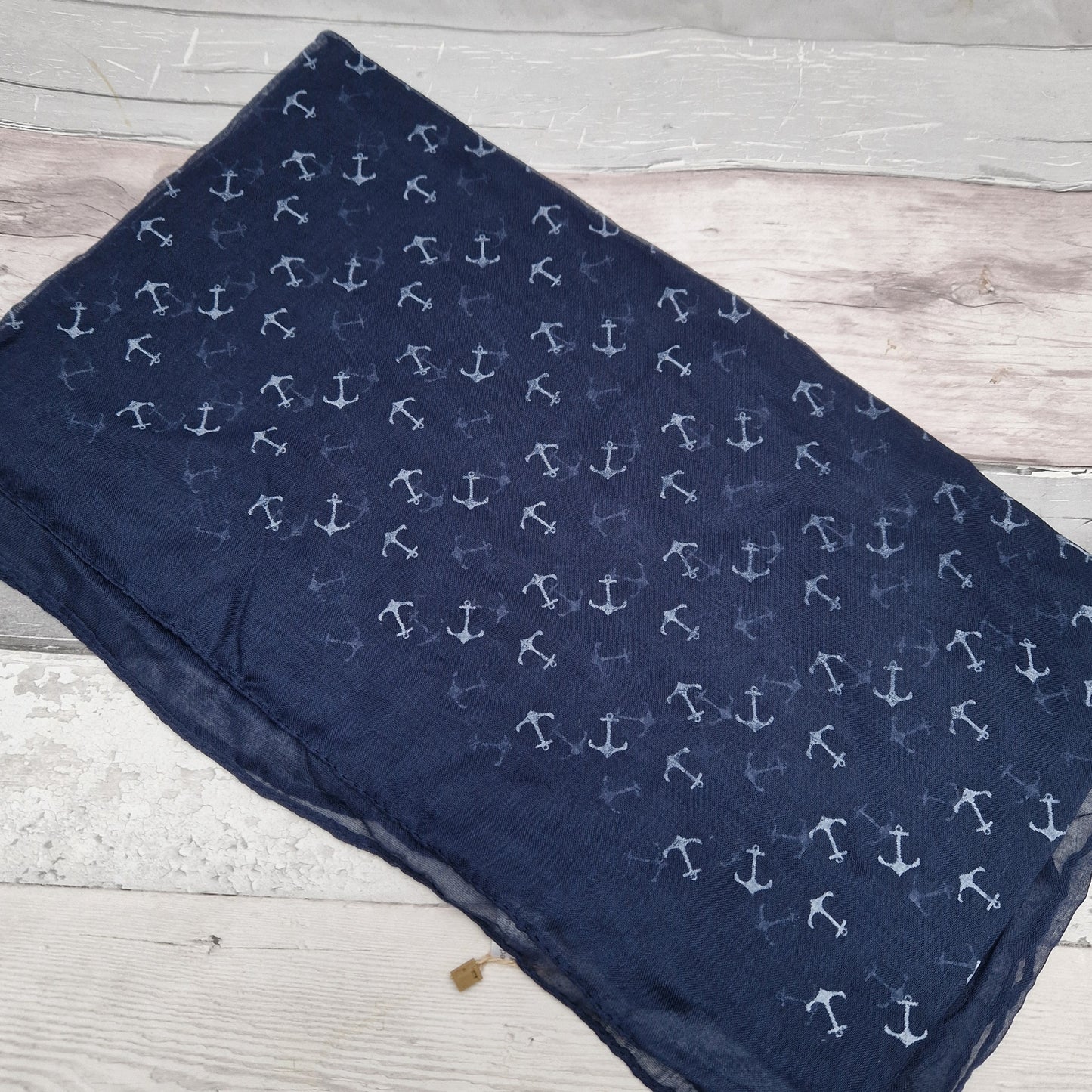 Nautical themed scarf in classic navy, decorated with white anchors