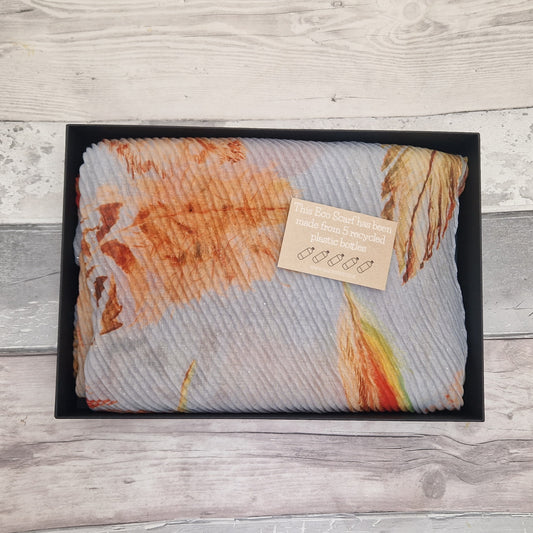 Gift Boxed Eco Scarf in Grey with Orange coloured leaves and feathers.