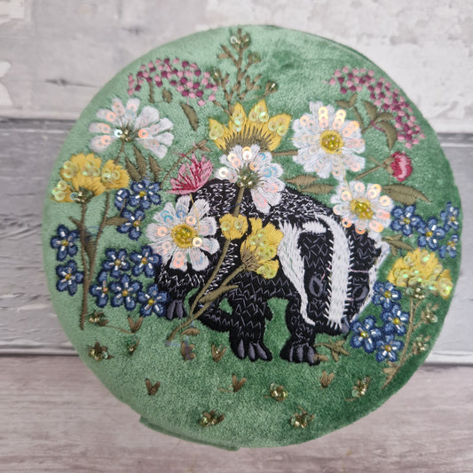 Green velvet covered jewellery box featuring an embroidered design of a Badger in a flower garden. Finished with beads and sequins.